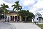 Former Seaboard Air Line Hialeah Market station building on left and Tri-Rail shelter on the right 